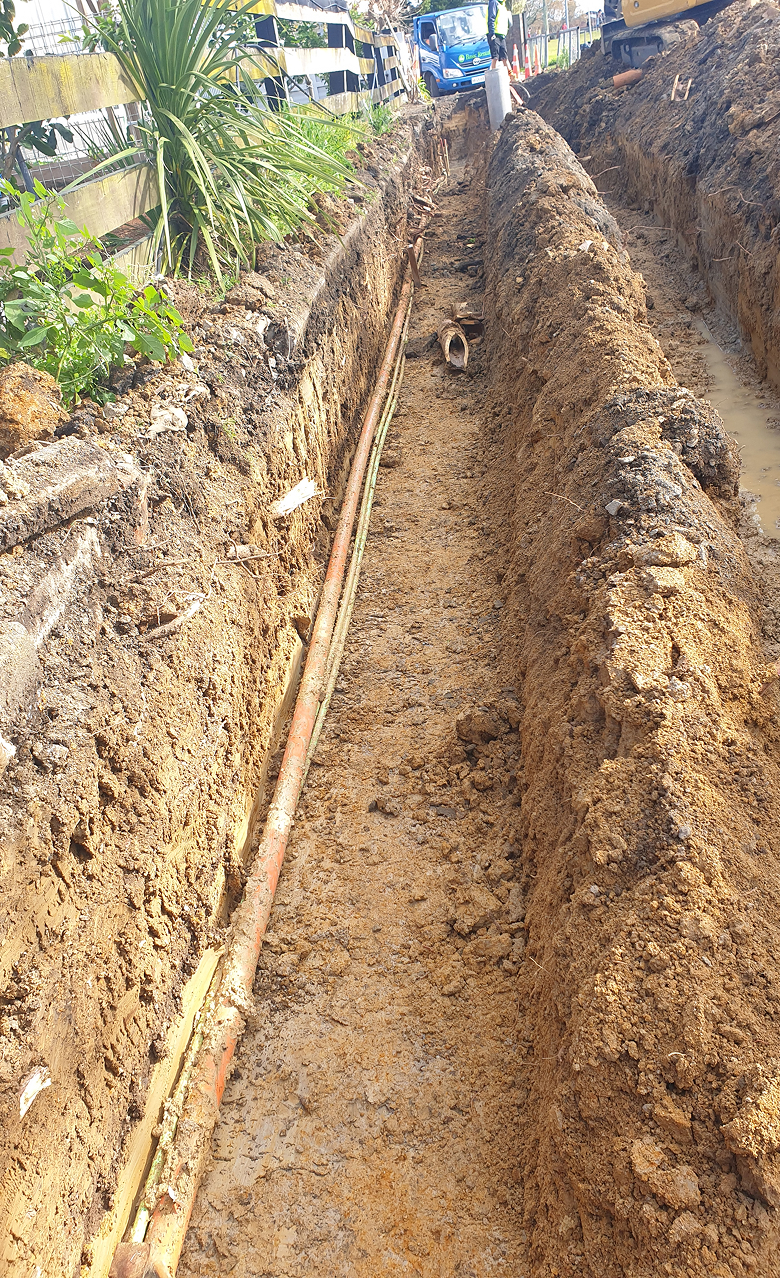 Ground dug up for subsoil drainage installation
